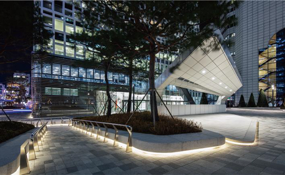 Hanwha HQ's media stage, with its welcoming lighting, has been designed to be as inclusive as it is renewable